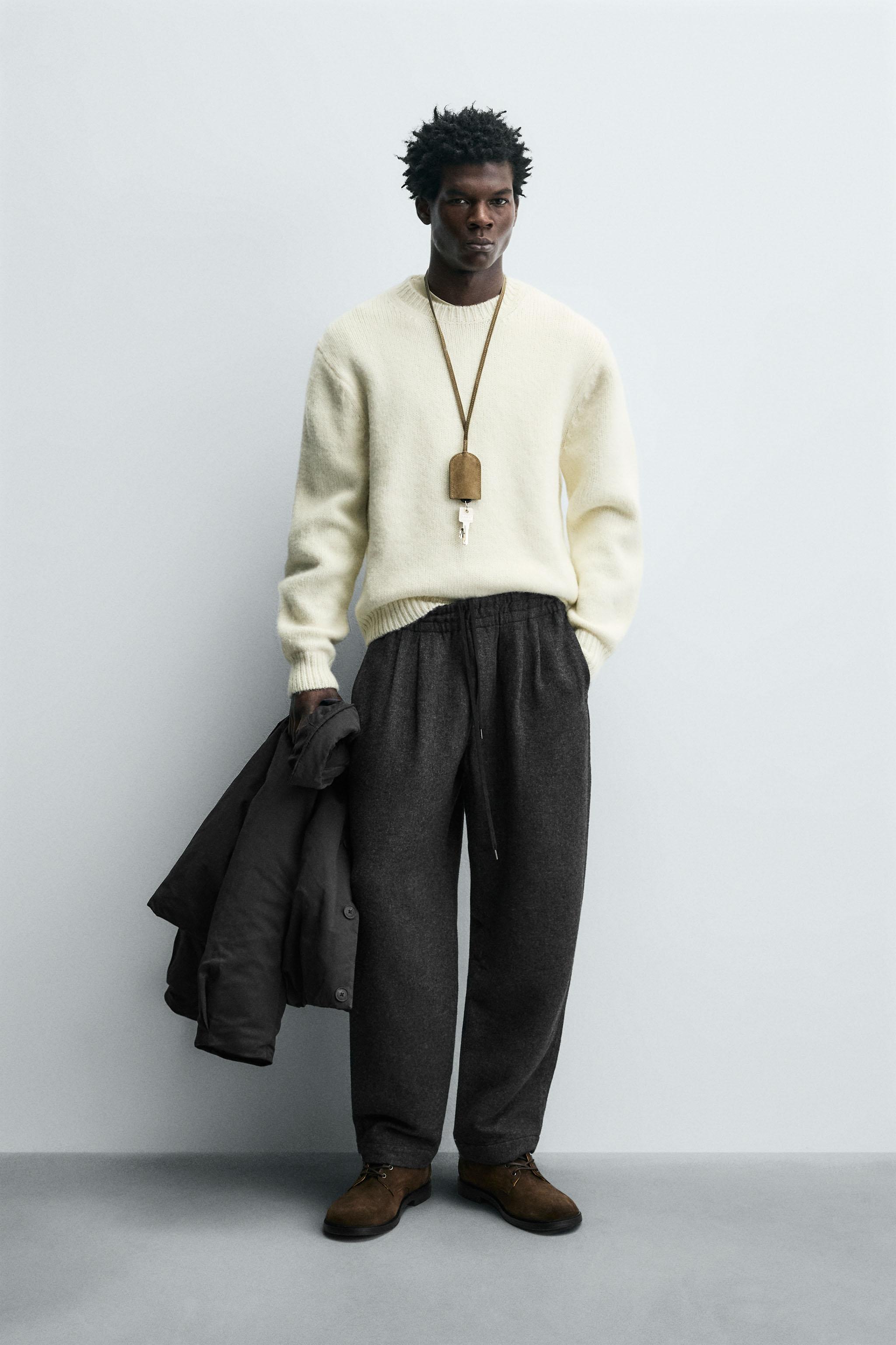 PLEATED WOOL PANTS